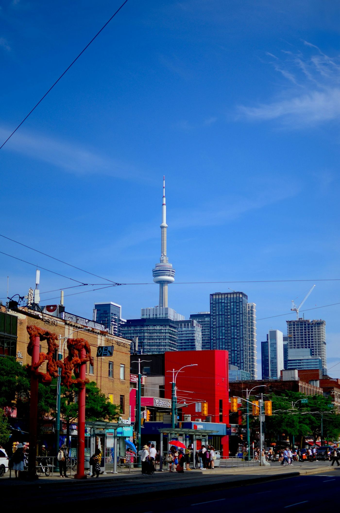 Downtown Toronto with the CN Tower under a clear blue sky